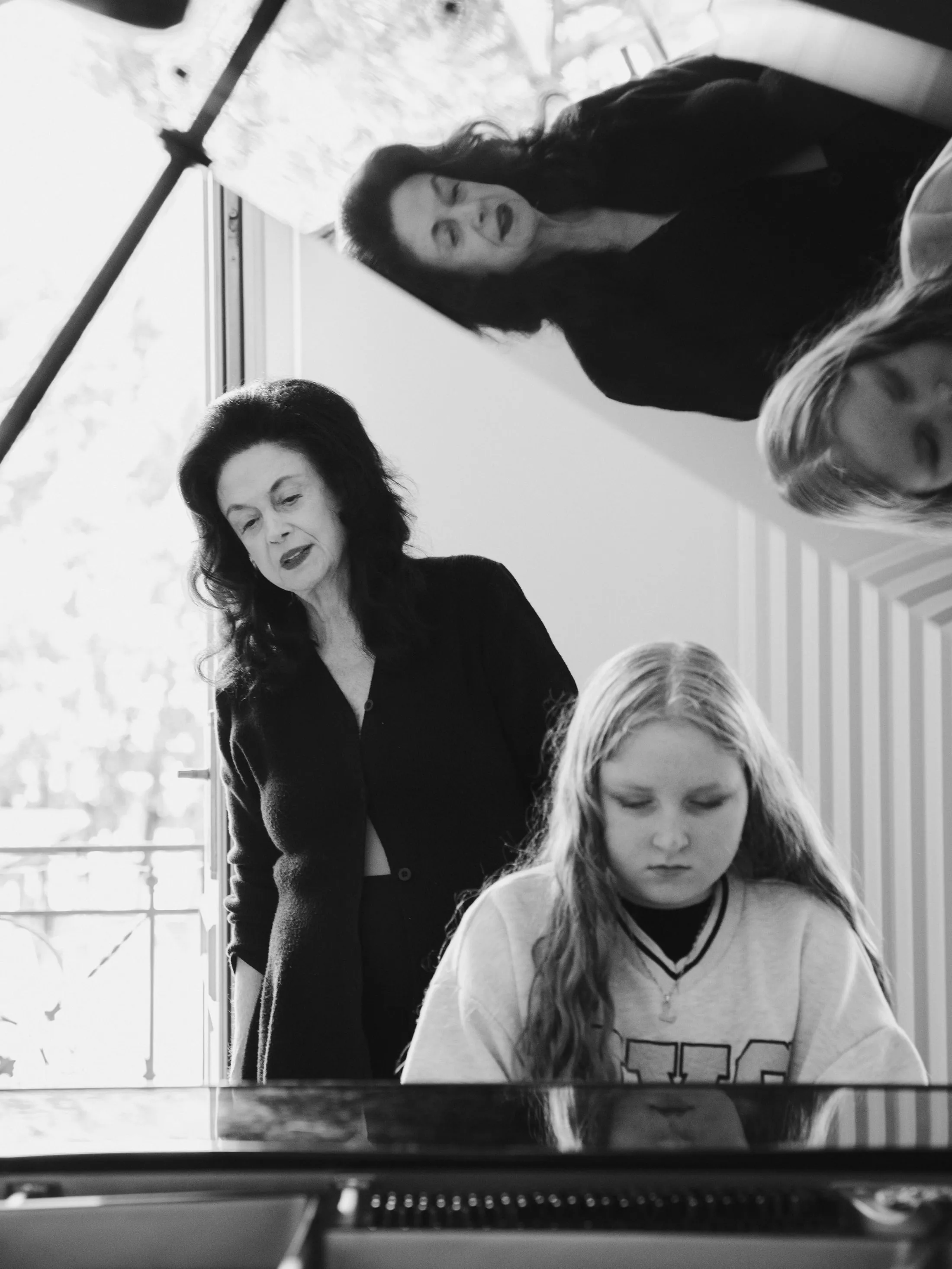 Giselle Brodsky teaching a student at the piano